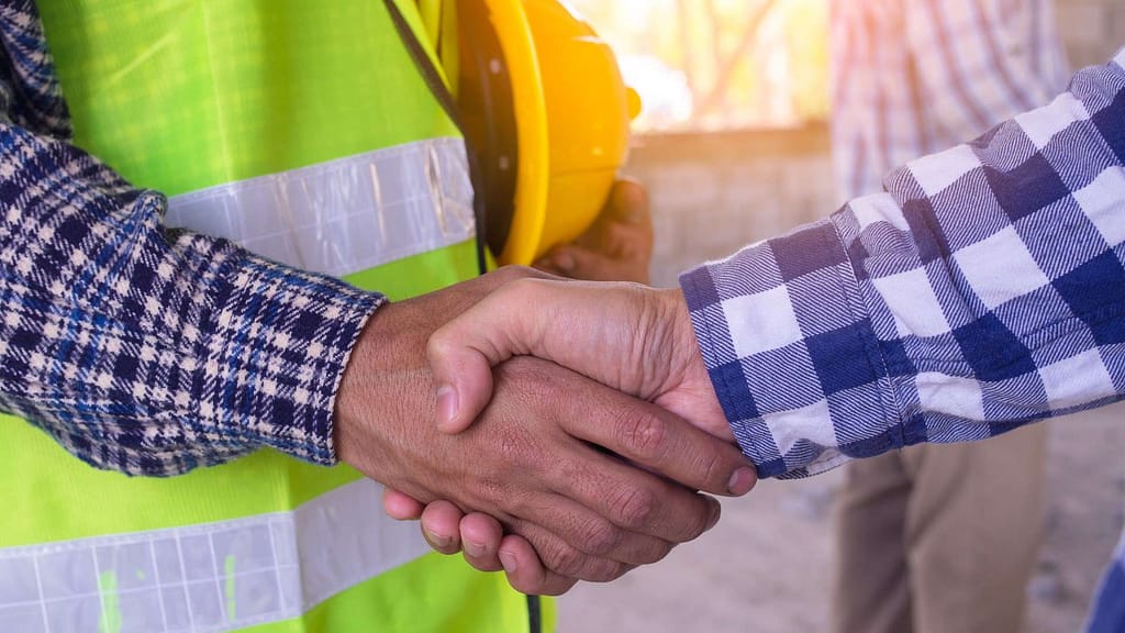gutter installation maryland contractors shaking hands