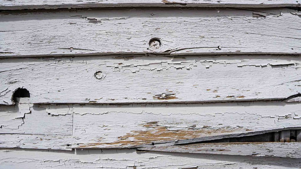 faded and cracked siding inspected by siding company virginia