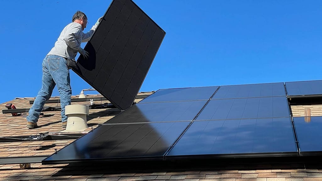 solar roofers installing panels