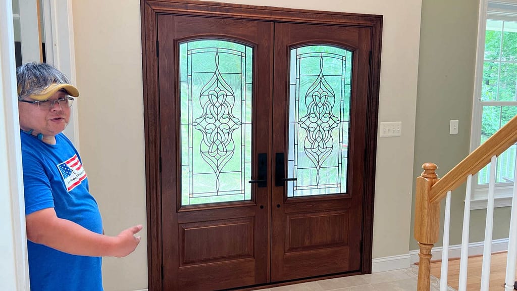 wooden entry door installed by American Home Contractors