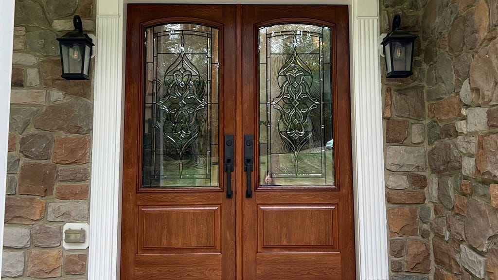 wooden entry door installed by American Home Contractors