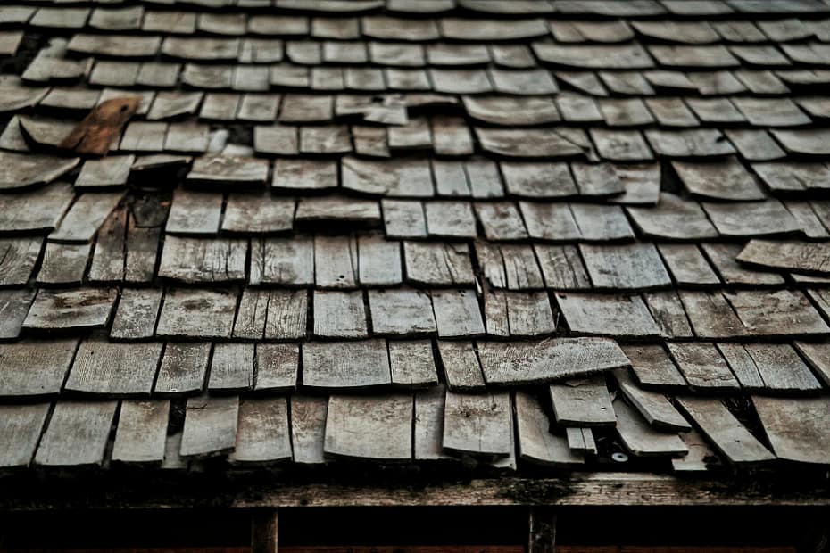 signs of storm roof damage on a residential dwelling.