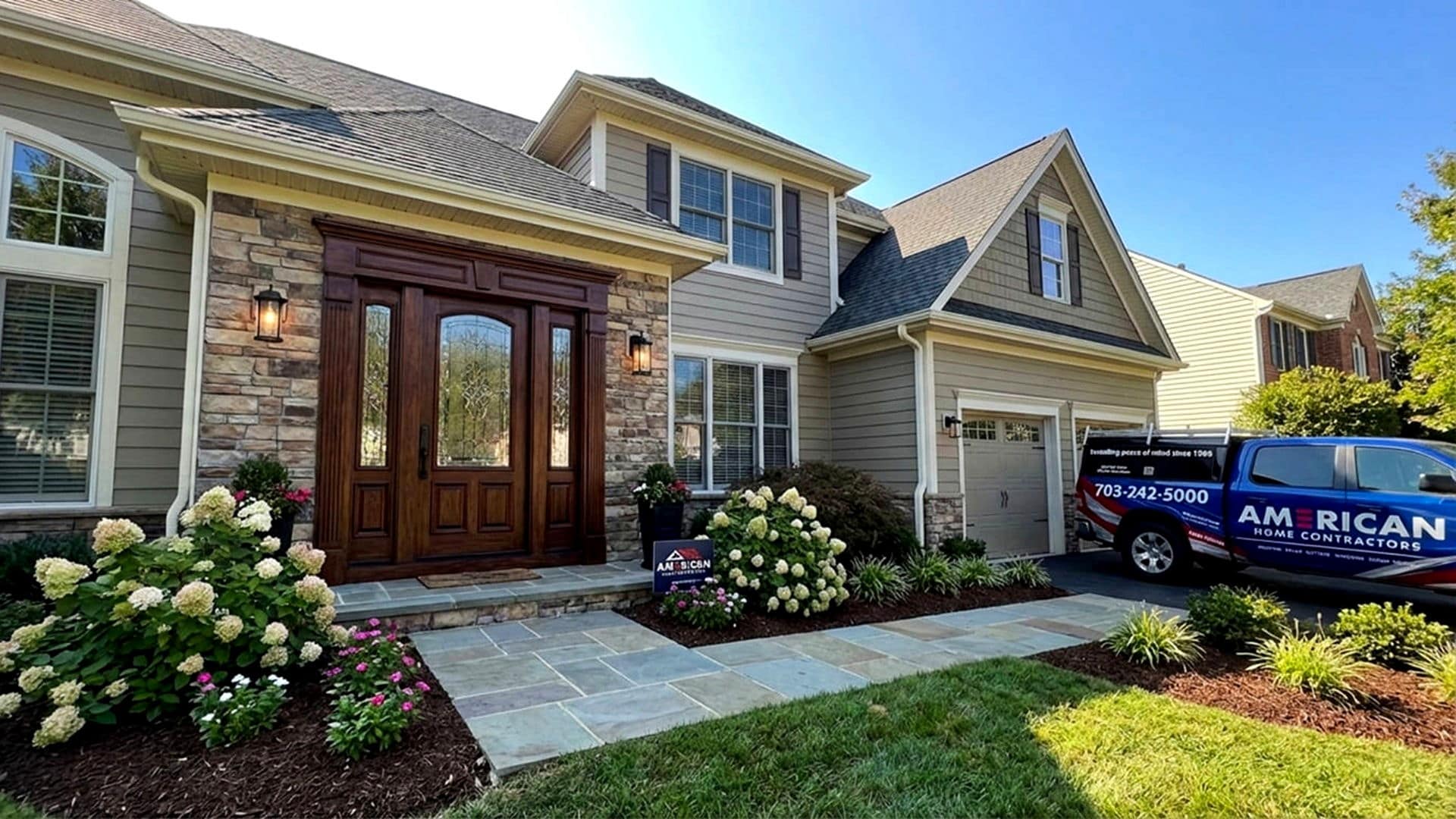 Wooden door home with AHC Truck in driveway