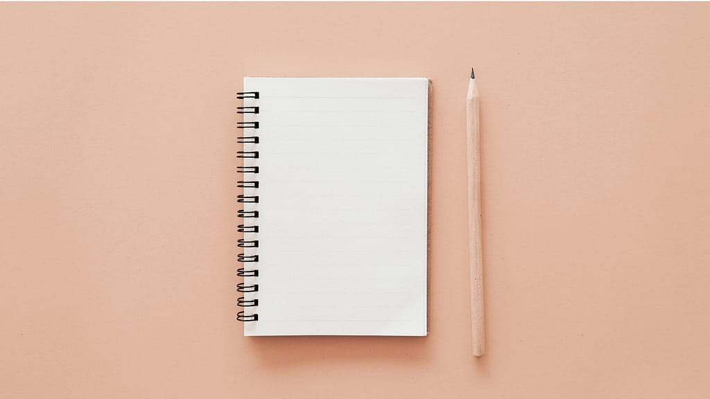 A pencil and a notepad